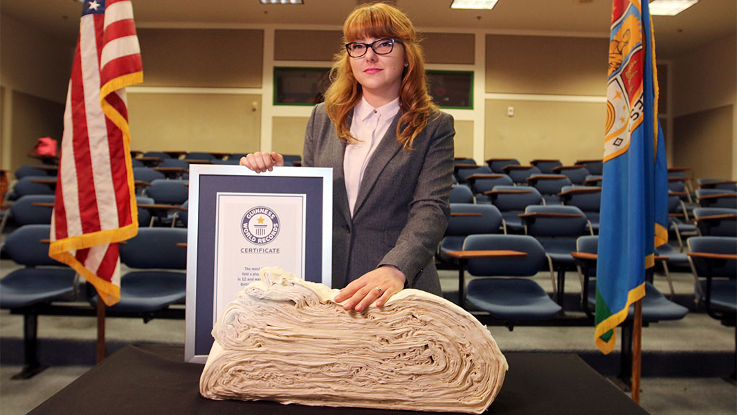 Britney with her folded paper and GWR certificate