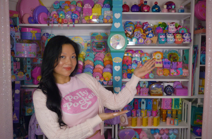 Kerchie pointing at her collection