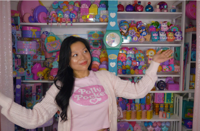 Kerchie smiling with her collection
