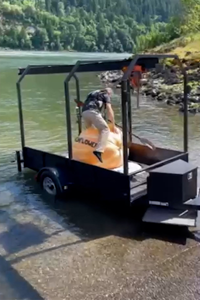 Gary climbing into his boat