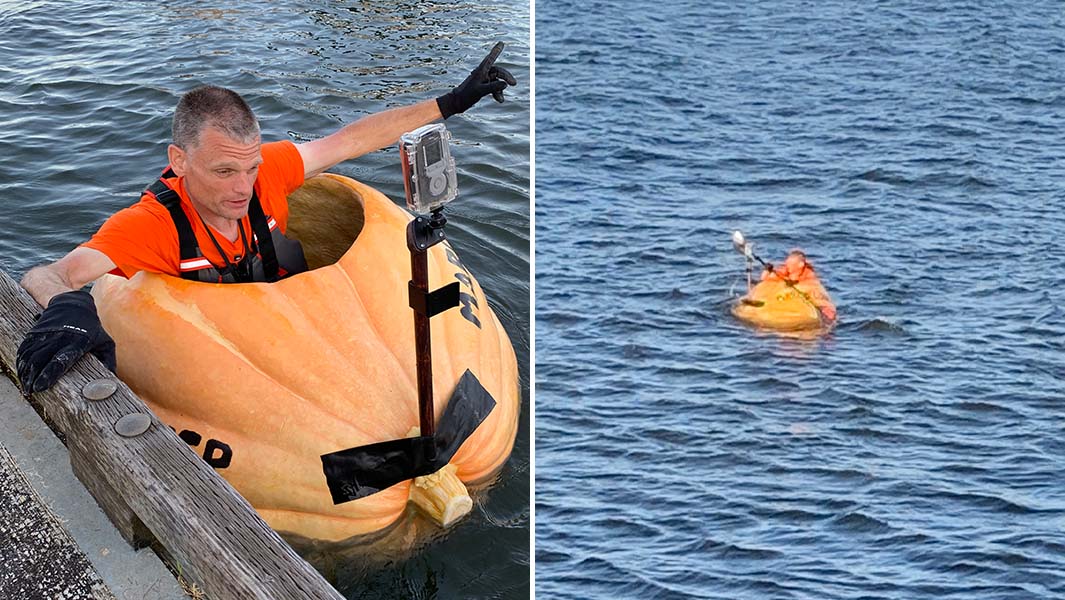 Gary sitting in his pumpkin boat and sailing it