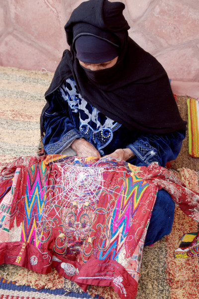 Egyptian woman embroidering