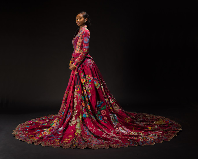 Embroiderer wearing the dress