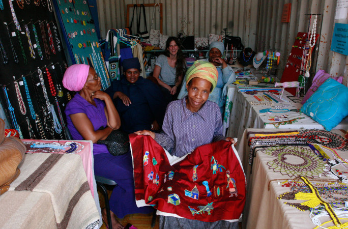 South African women embroidering