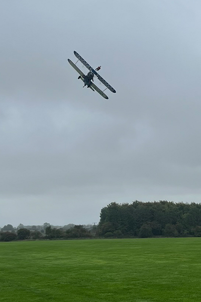 the plane tipping to the side with John on top