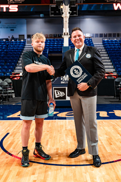 Shaking hands with Adjudicator