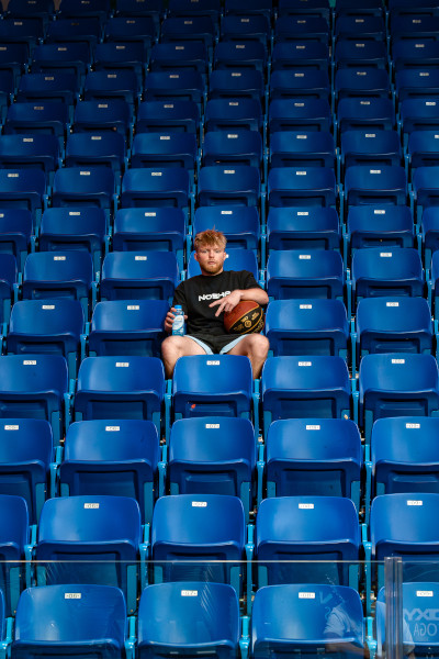 Sitting in the stands with his Electrolit