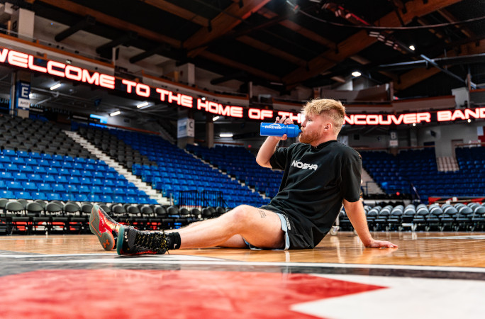 Drinking Electrolit on the court