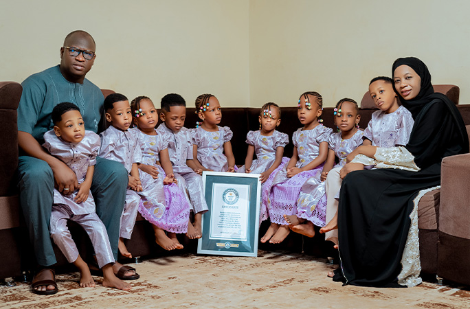 The nonuplets with their parents