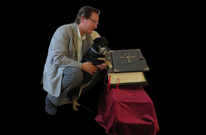 Michele with his dog and his latest backwards book