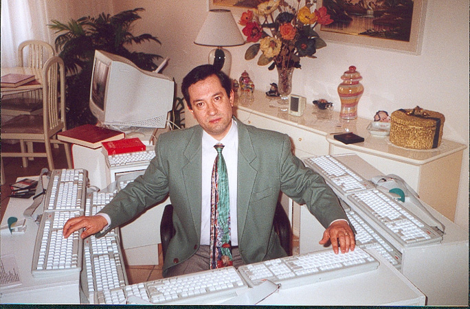 Michele surrounded by keyboards