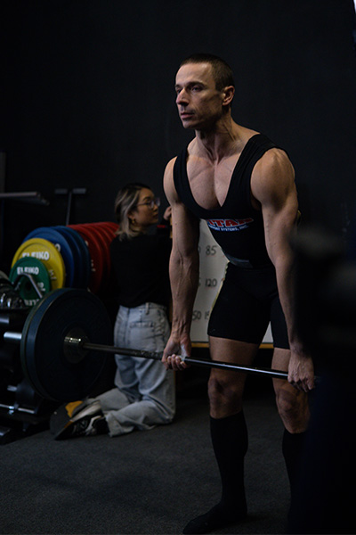 Maciej lifting the weight