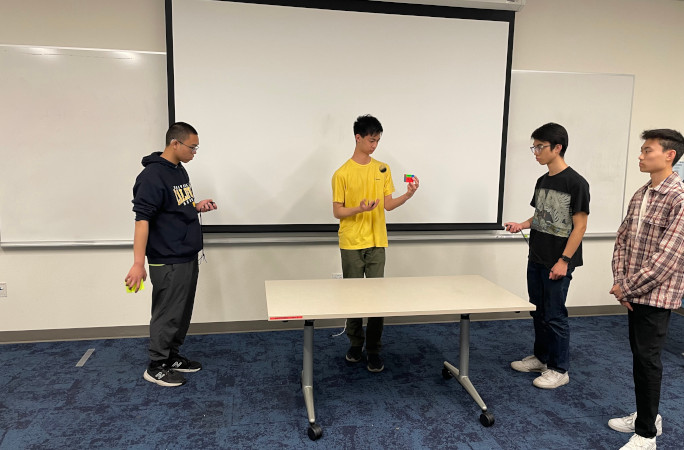 Juggling with hacky sacks and a cube