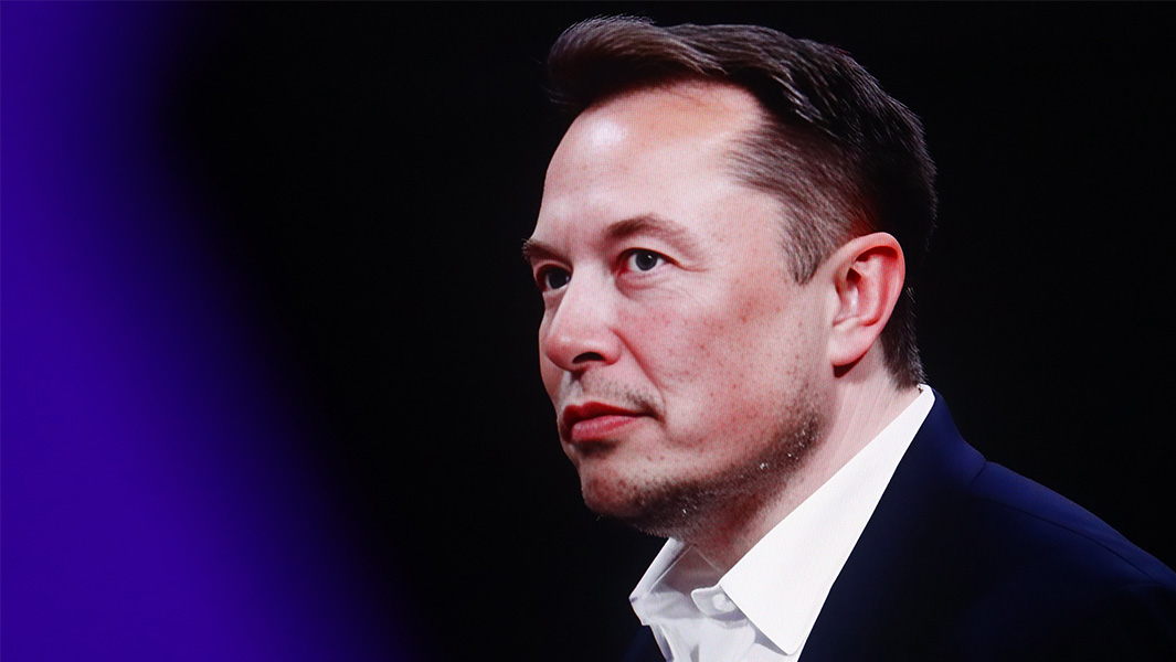 Elon Musk looking off to the side