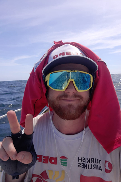 Karlos giving the peace sign