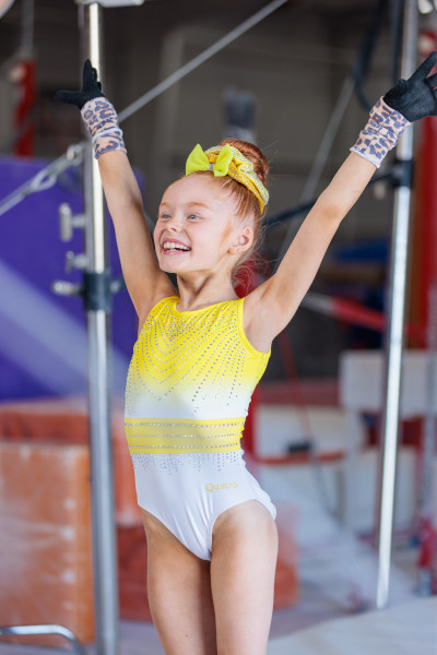 Kynlee posing after landing a jump