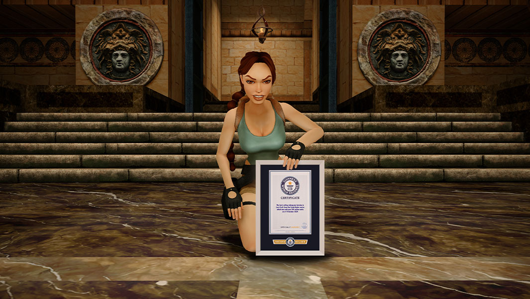 Tomb Raider's Lara Croft holding a Guinness World Records certificate