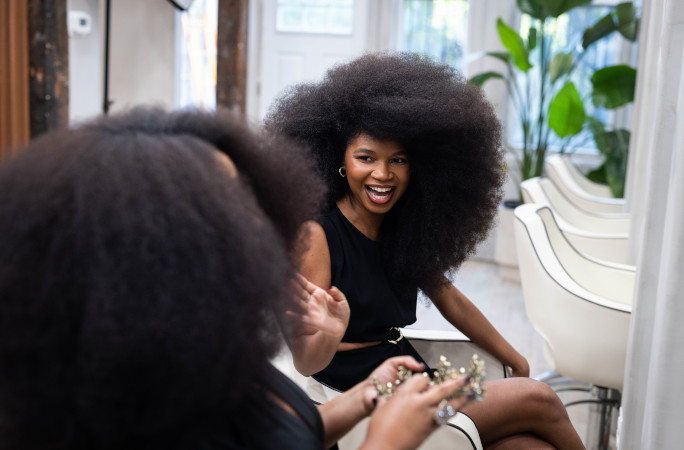 Jess smiling as she accepts the crown