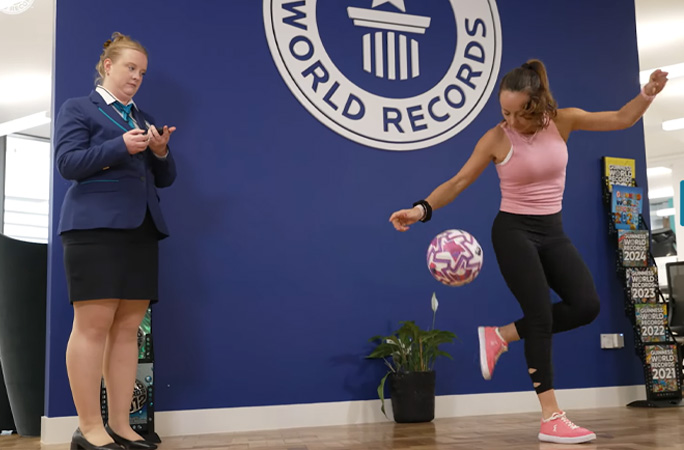 laura attempting record with adjudicator