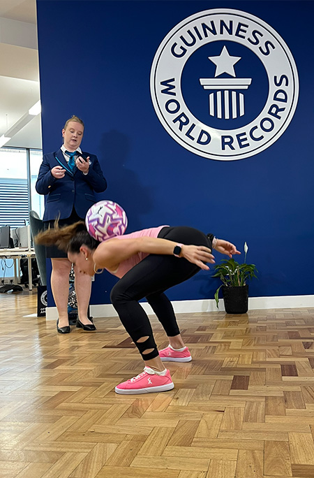 Laura doing around the moon trick