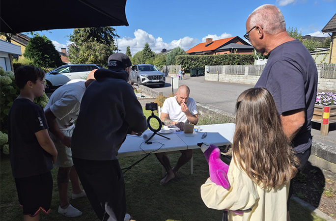 Martin with a crowd watching