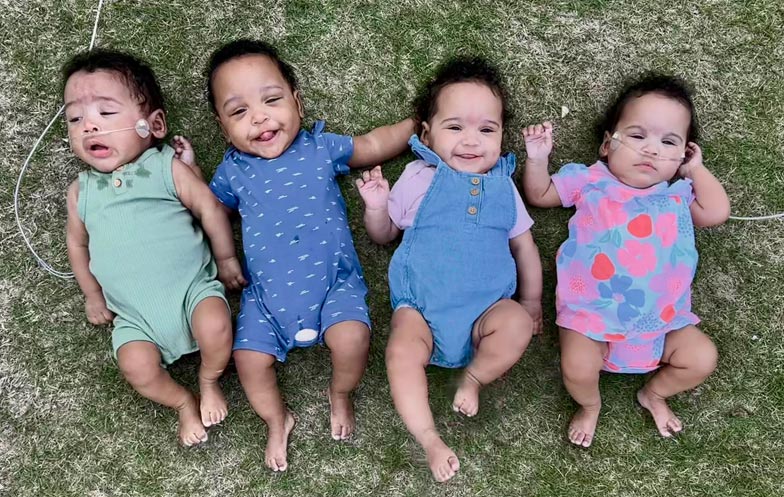 Most premature quadruplets smiling