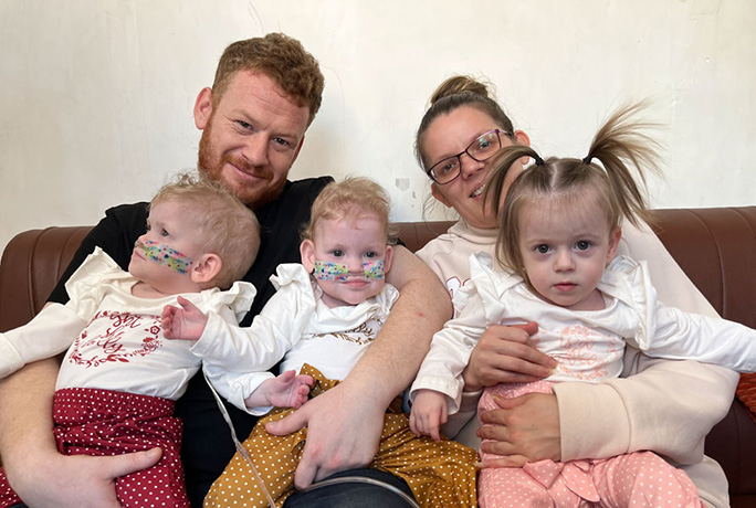 most premature triplets with family