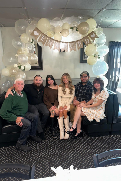 Bill with all his adopted siblings