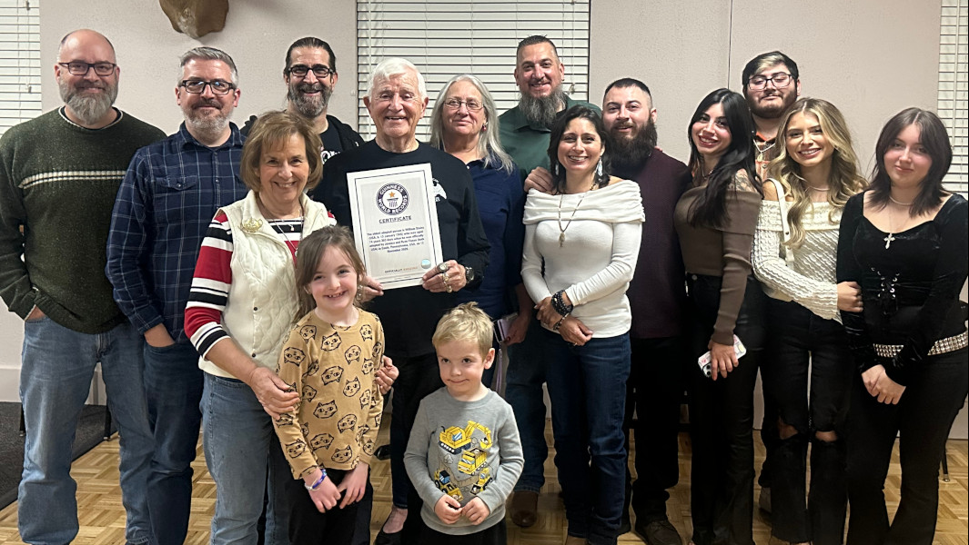 William Stains with the Fiscus family and his GWR certificate