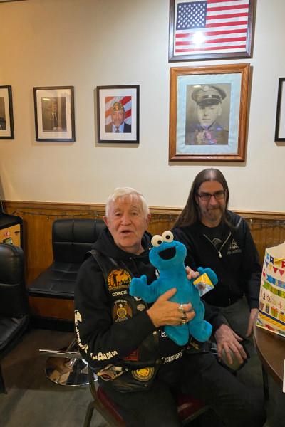 Bill with a friend and Cookie Monster
