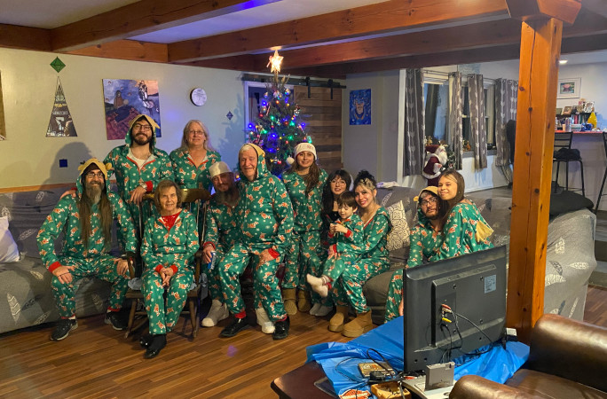 Bill and his adopted family in matching PJs