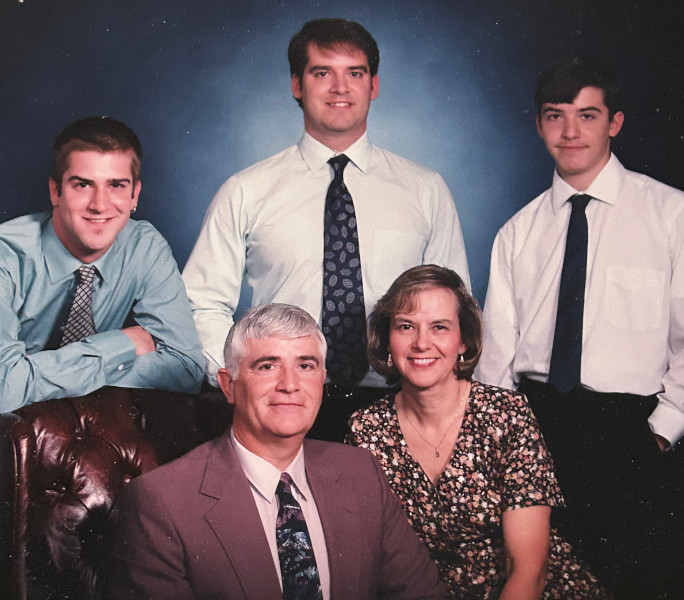 Bill with his wife and three sons