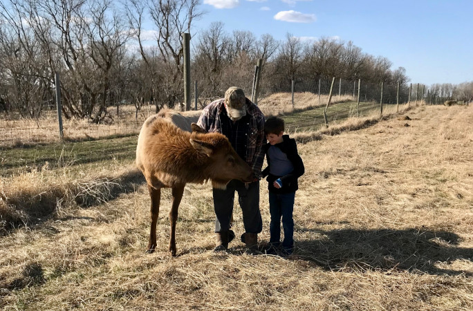 Beauty sniffing a toddler