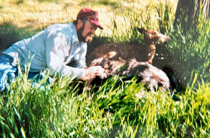 Lloyd playing with a young Beauty