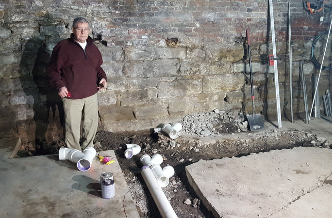 Ross working in the basement