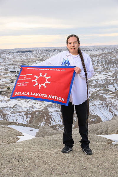 Reuben with a Lakota flag