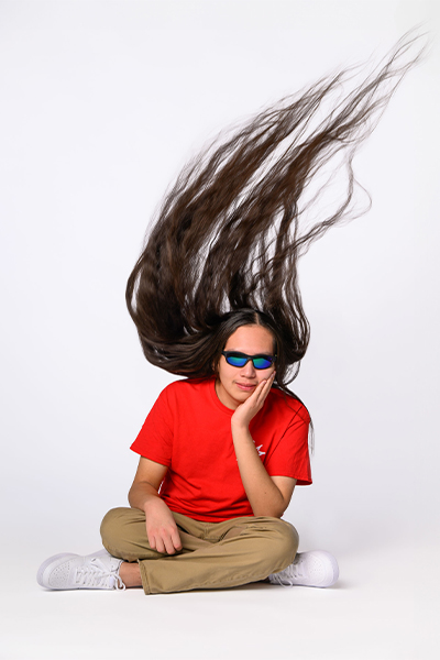 Reuben with his hair swooshing above his head