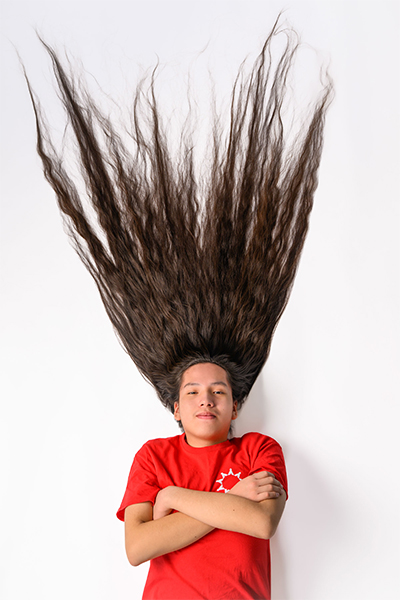 Reuben with his hair on the floor around him