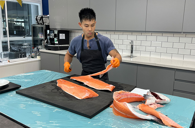 Wallace filleting the fish