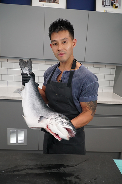 Wallace holding a fish