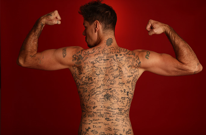 Funky's back covered in tattoos