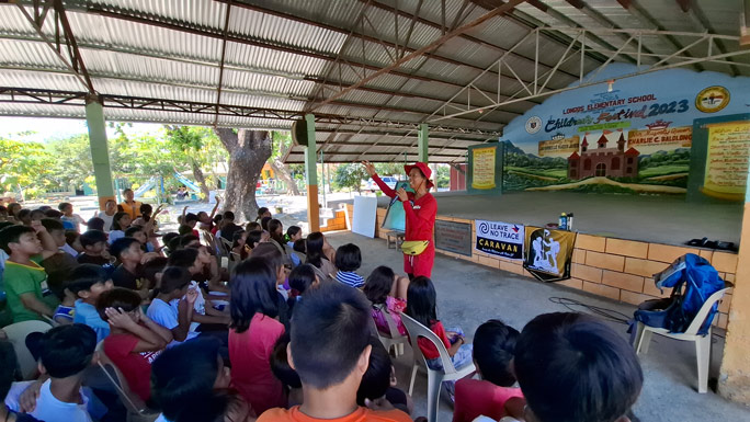 Lito at an elementary school giving talks