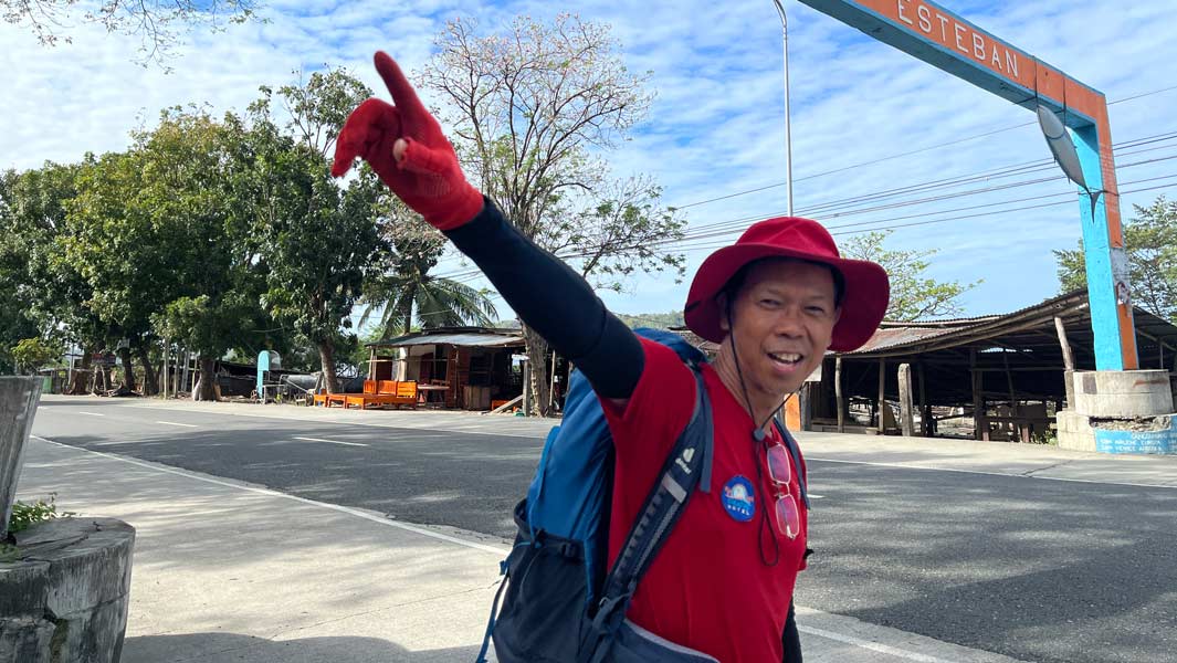 Fastest crossing of the Philippines on foot - Lito in front of Esteban gate