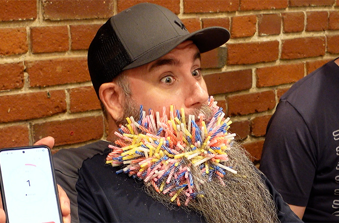 Joel with birthday candles in his beard