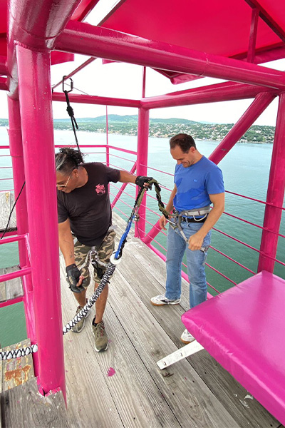 record holder getting in his harness to jump