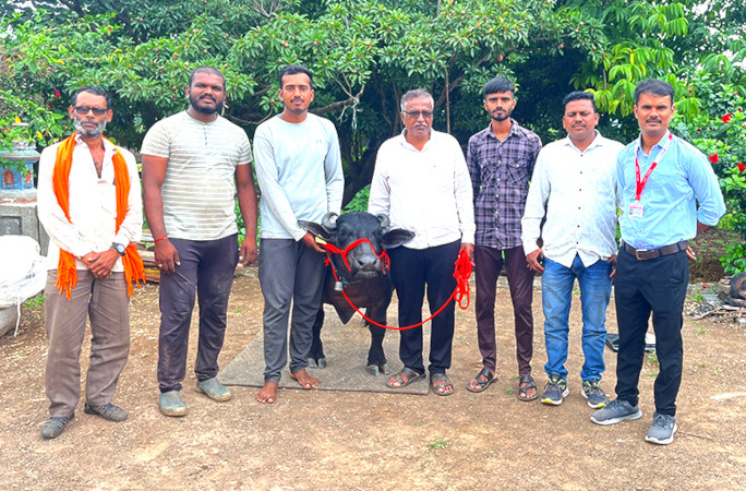 Radha with the farm and agricultural workers