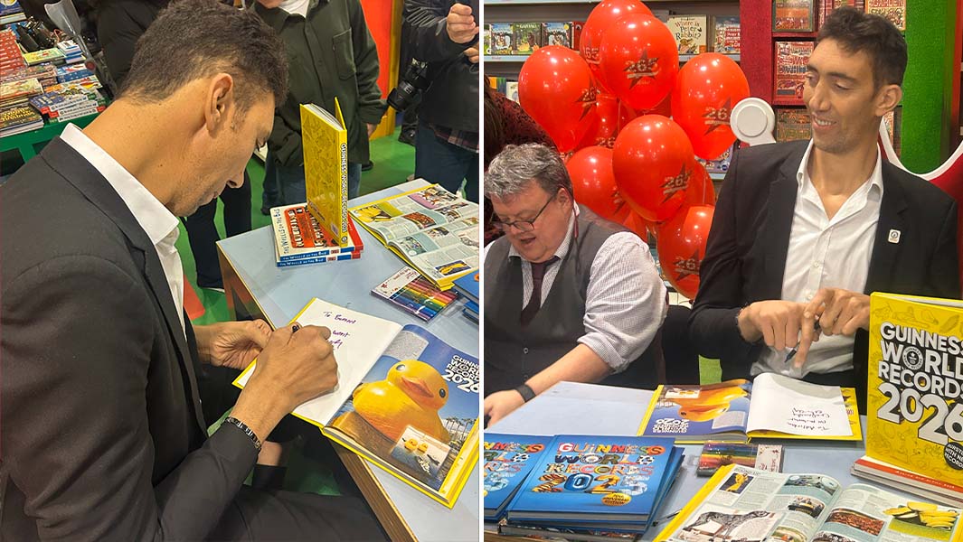 Sultan at Hamleys signing GWR books with Craig Glenday