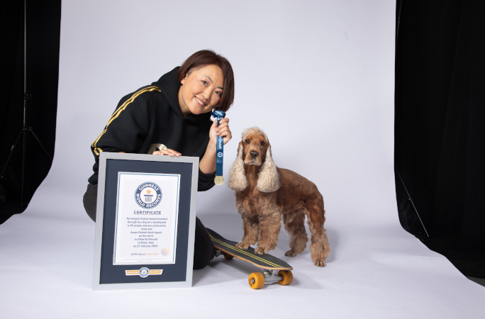 A picture of Coda the Cocker Spaniel with his owner