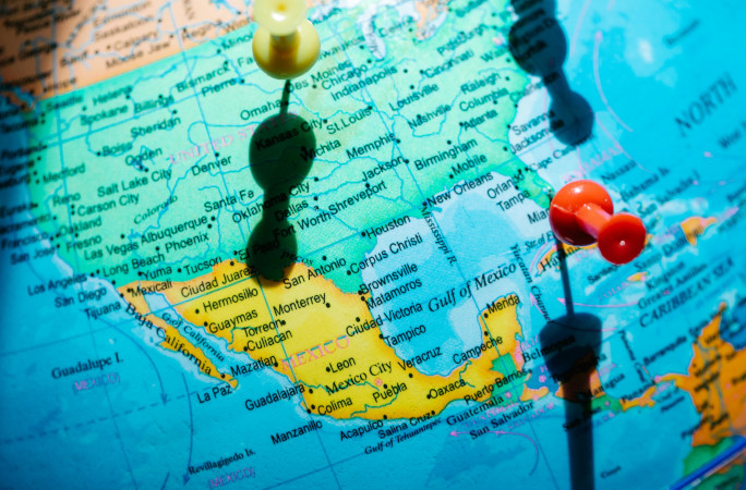 Generic picture of a map, with the United States being in focus. Photo Credit: Lara Jameson/Pexels.