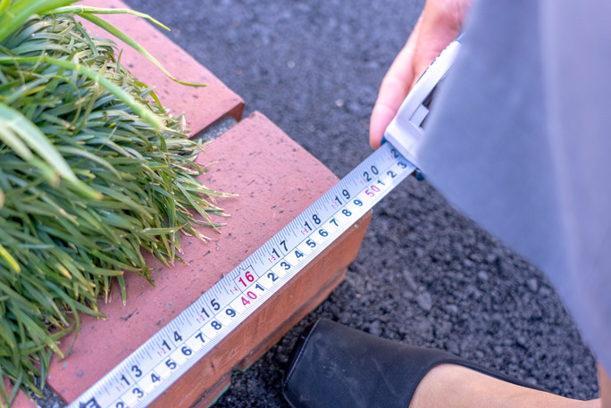 Close up shot of smallest park being measured